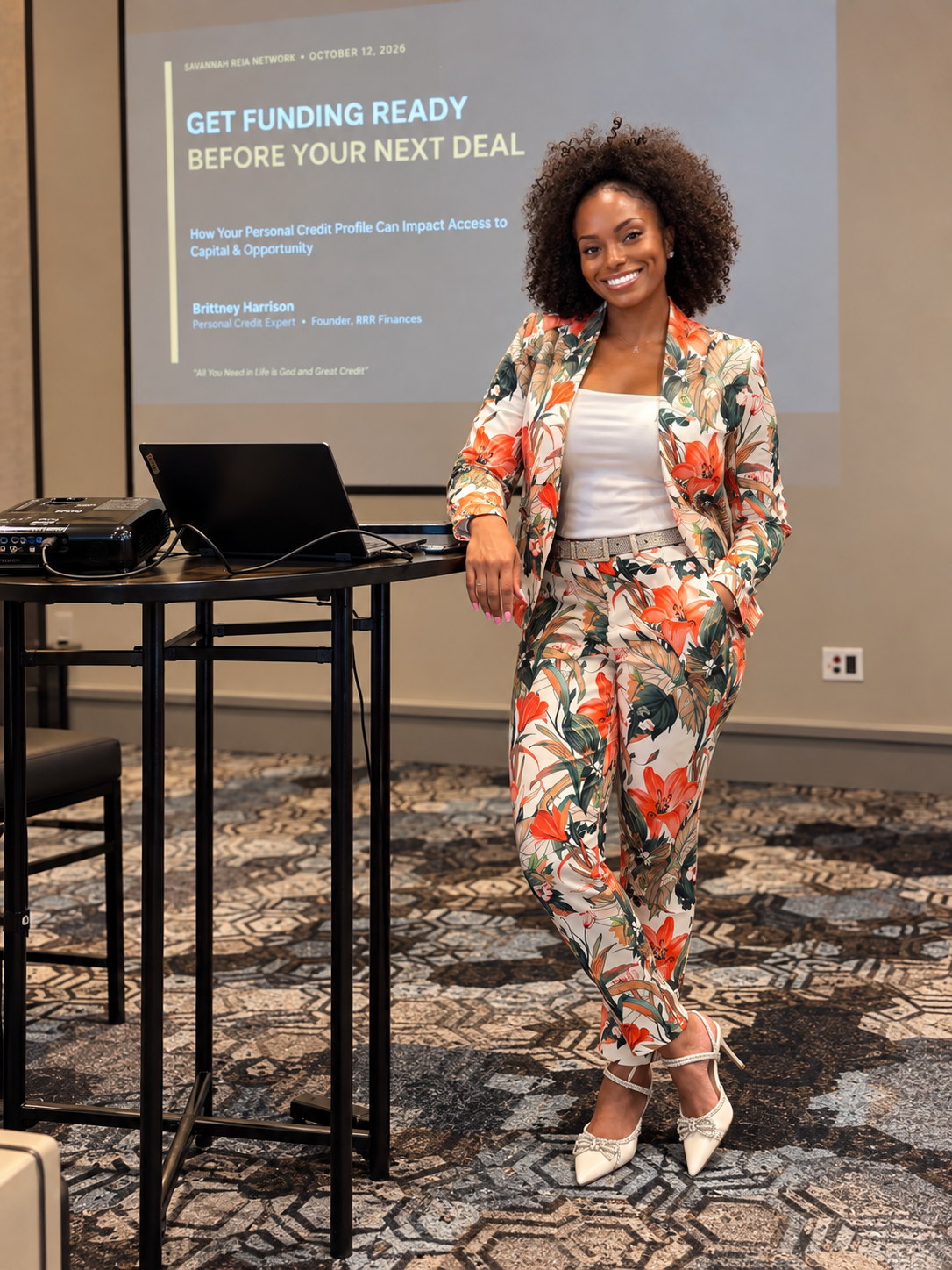Brittney Harrison at the podium with Get Funding Ready presentation slide